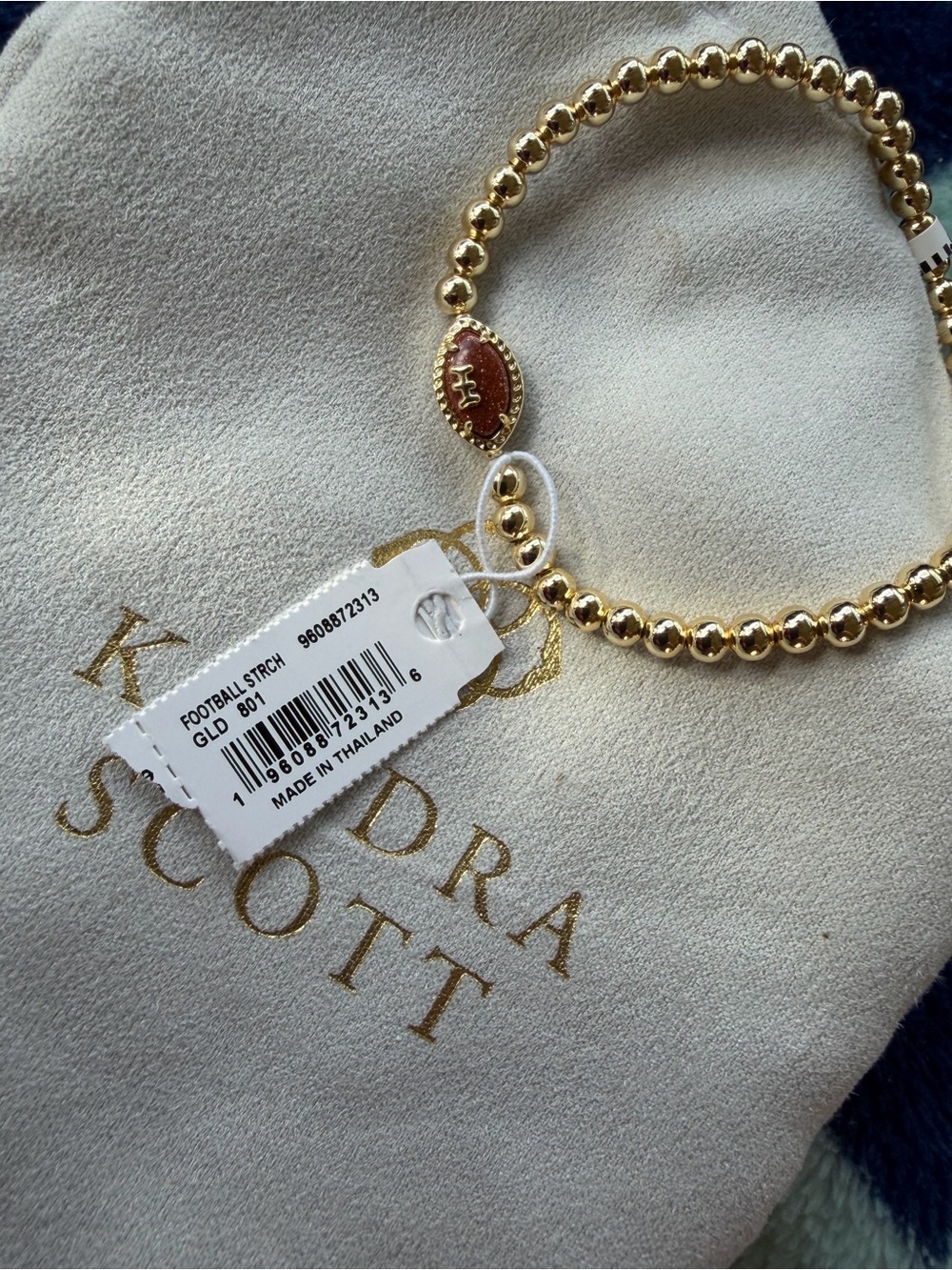 Kendra Scott Gold Beaded Bracelet with Brown Football Charm
